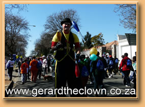 RD doing stilt Busking at 702 walk the talk